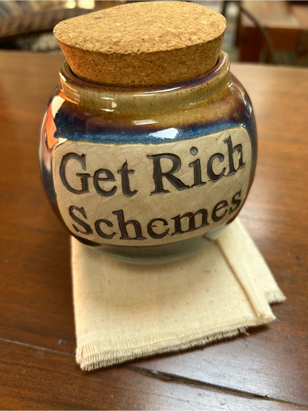 Handcrafted Ceramic Vase in Blue and Browns with cute “Get Rich Schemes” saying.